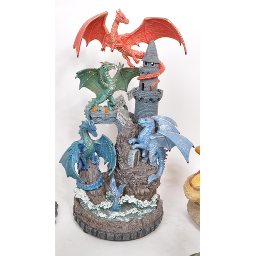 236 - A collection of assorted contemporary resin and pewter dragon figures, including makers such as The ... 