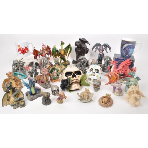 237 - A large collection of contemporary plastic and resin, dragon, and skull figures. Including, snow glo... 