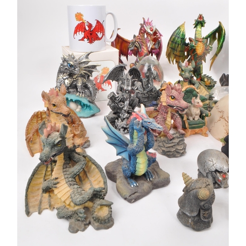 237 - A large collection of contemporary plastic and resin, dragon, and skull figures. Including, snow glo... 