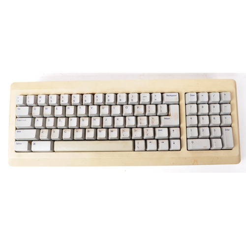 246 - Apple - A collection of vintage late 20th century Apple Macintosh keyboards and mice. The collection... 