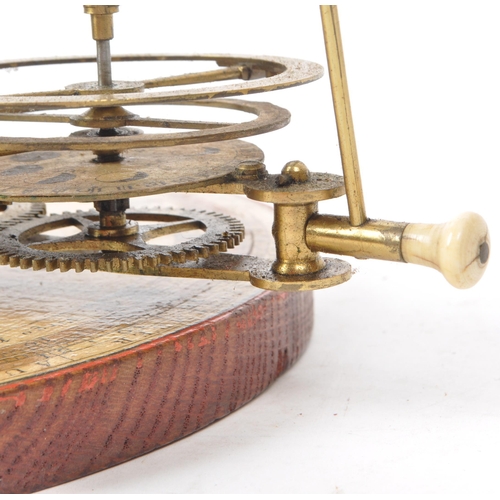 250 - W. Jones - London - A 19th century 'New Portable Orrery' housed within a wooden box. It features a r... 