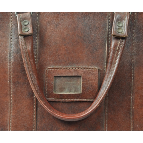 251 - A vintage 20th century tan / brown leather portmanteau Gladstone travelling / medical bag. Twin carr... 