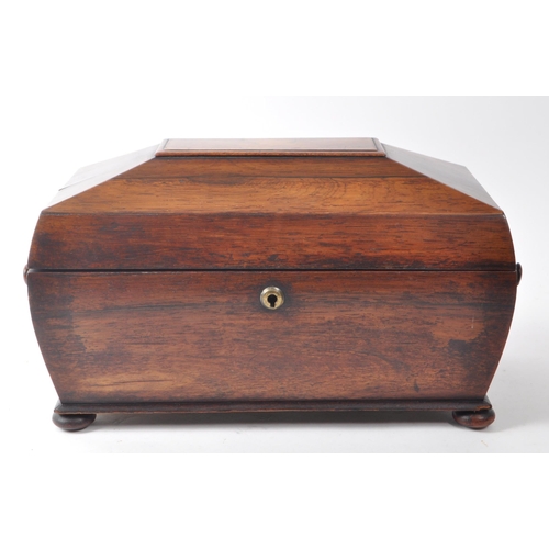 264 - A 19th-century mahogany sarcophagus tea caddy, featuring twin compartments with brass hinged, bevele... 