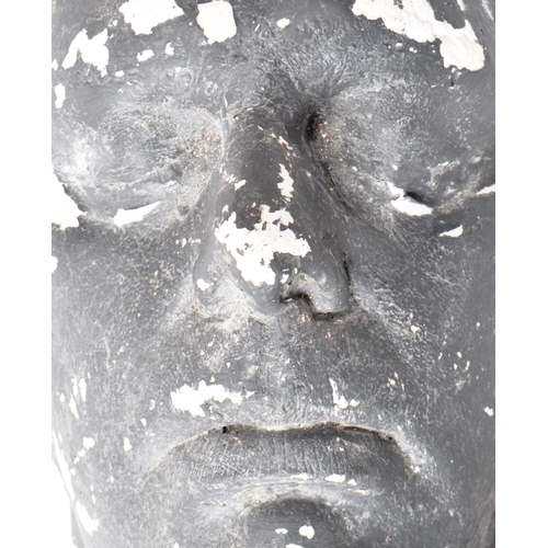 268 - A vintage 20th-century macabre plaster death mask of an unknown man. Painted grey to the exterior. M... 