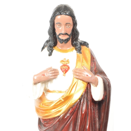 272 - A large vintage 20th century plaster Jesus mantel figure sculpture, hand painted with gilt detailing... 