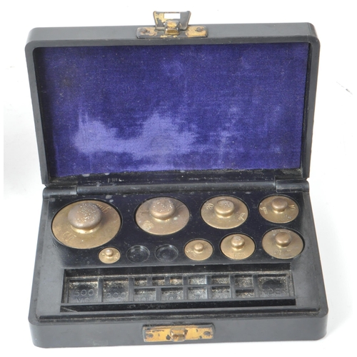 277 - L. Oertling Ltd - An early 20th century London balance scales model. 52F.M and weights, stored in a ... 