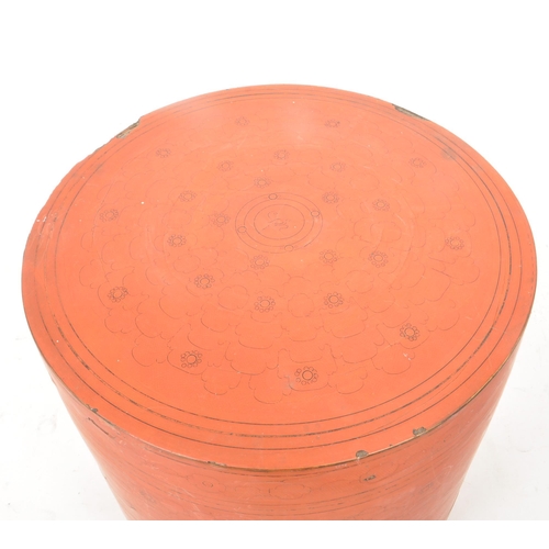 278 - An early 20th century red lacquered Thai food box / container. Cylindrical form with pull off top, r... 