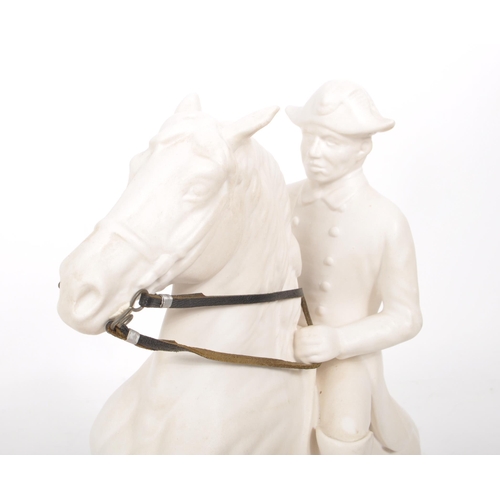 28 - A vintage 20th century white porcelain man riding a horse figure, featuring attached leather straps ... 