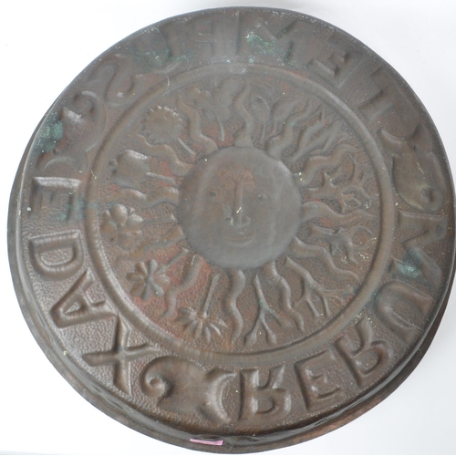 280 - An early 20th century large repousse Zodiac wall charger, with the Latin lettering 'Tempus Edax Reru... 