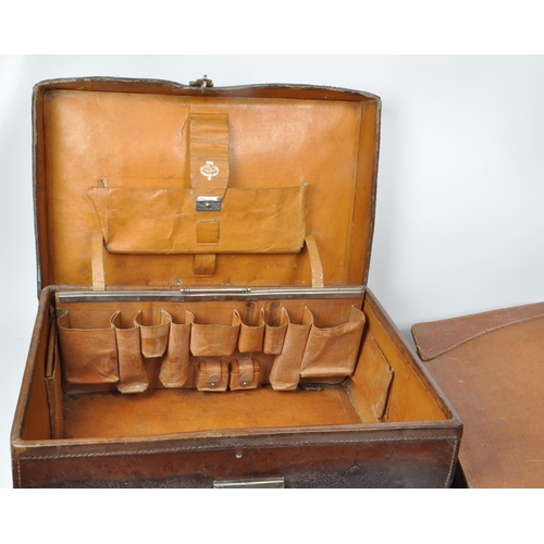 282 - Three 20th century leather bags, including a Gladstone leather satchel, a Fisher trunk / briefcase, ... 