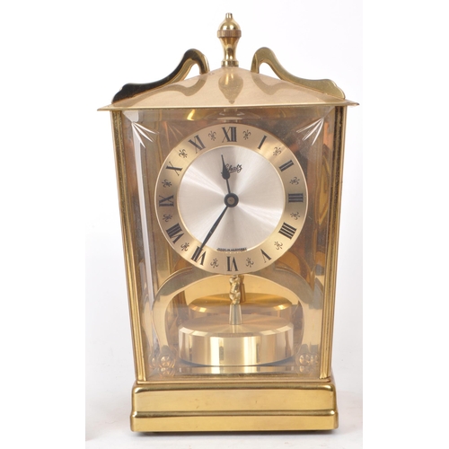 291 - A collection of three 20th century brass mantel clocks, comprised of a West German Aug. Schatz and S... 