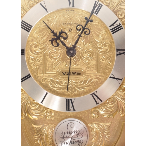 291 - A collection of three 20th century brass mantel clocks, comprised of a West German Aug. Schatz and S... 