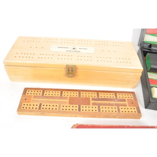 292 - A collection of assorted vintage 20th century board game pieces, comprised of a Korean backgammon br... 