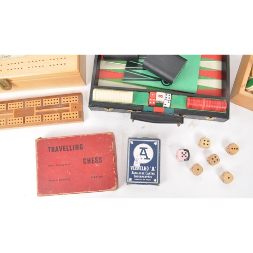 292 - A collection of assorted vintage 20th century board game pieces, comprised of a Korean backgammon br... 