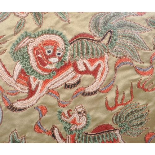 294 - A vintage 20th century Chinese embroidered silk tapestry, featuring two Chinese dragons to the centr... 