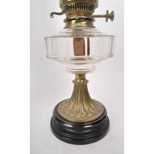 297 - A Victorian 19th century Messenger's patent oil lamp, featuring brass body and burner, glass bowl an... 