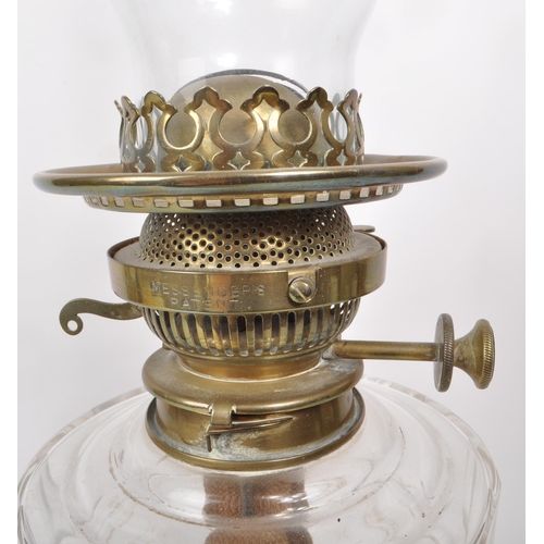 297 - A Victorian 19th century Messenger's patent oil lamp, featuring brass body and burner, glass bowl an... 