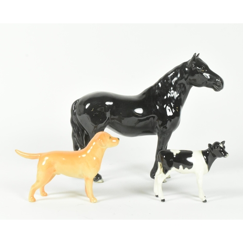 30 - Beswick - A collection of three 20th-century china porcelain animal figurines, comprising a Golden L... 