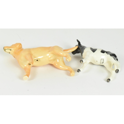 30 - Beswick - A collection of three 20th-century china porcelain animal figurines, comprising a Golden L... 