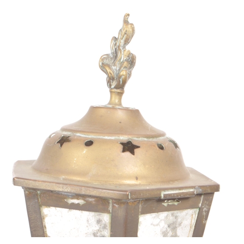 302 - A vintage early 20th century lamp post style brass table lamp, featuring six frosted glass panes for... 