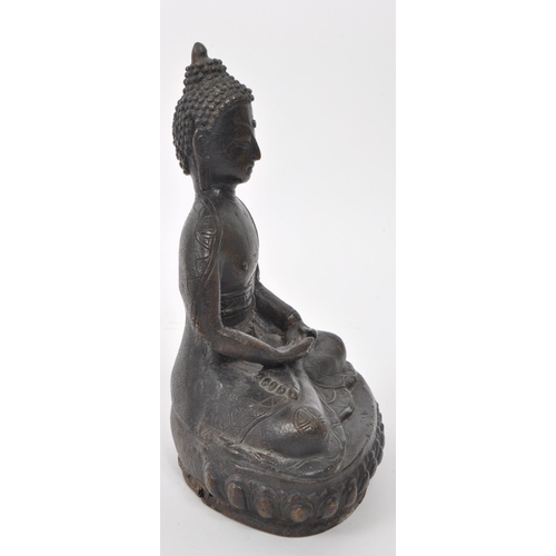 308 - A bronze 19th / early 20th century Sino-Tibetan statue of Buddha Shakyamuni. Serenity / double lotus... 