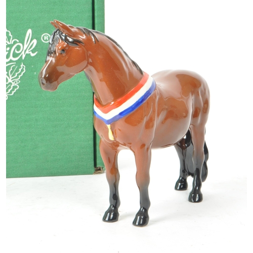 31 - Beswick - A 20th-century china brown gloss 'Another Bunch' horse. Featuring a brown horse standing, ... 