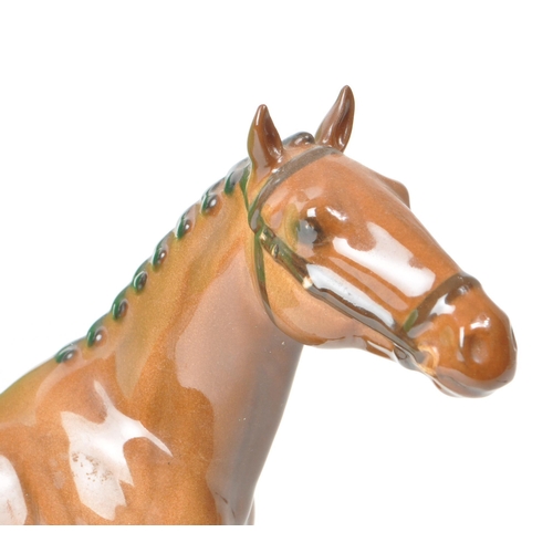 32 - Beswick - A 20th-century china brown gloss 'Hackney Pony' no. H261 figurine. Featuring a brown horse... 