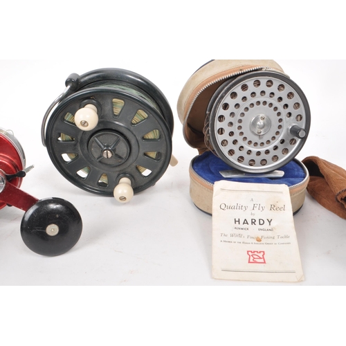 323 - A collection of eight vintage fishing reels, including examples by Beaudex, Ambassadeur 9000 (ABU), ... 