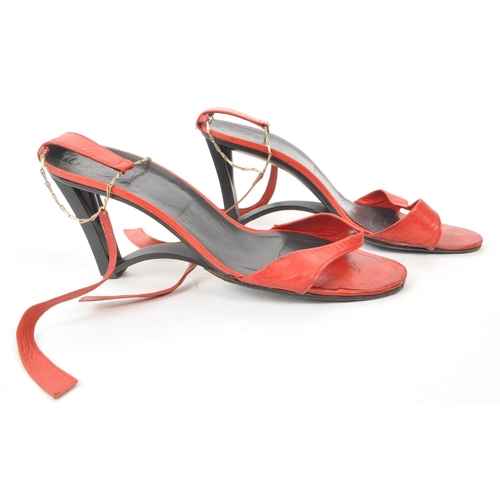 344 - Christian Dior Souliers - A pair of vintage red leather heels / sandals, featuring an open toe strap... 