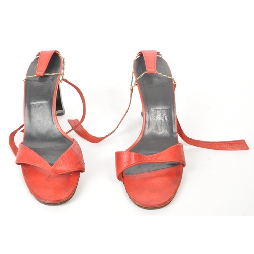 344 - Christian Dior Souliers - A pair of vintage red leather heels / sandals, featuring an open toe strap... 