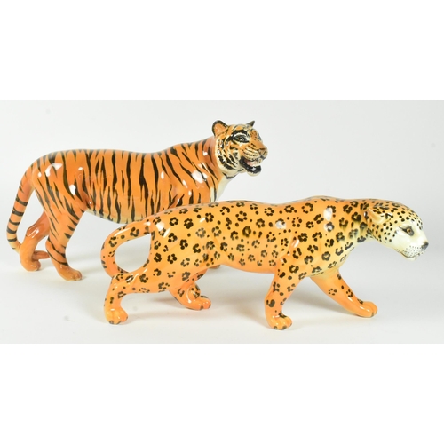 35 - Two gloss finish 20th century Beswick figurines including a cheetah and a tiger.