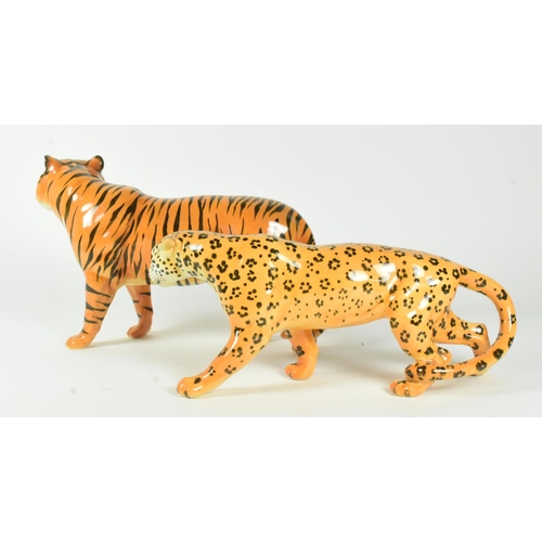 35 - Two gloss finish 20th century Beswick figurines including a cheetah and a tiger.