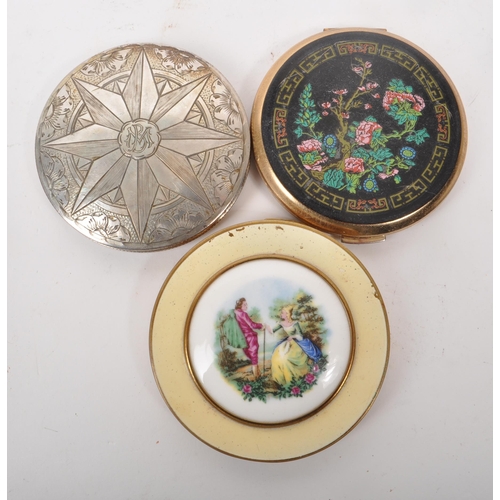 353 - A collection of five mid 20th century compact mirrors. The collection to include an enamelled exampl... 