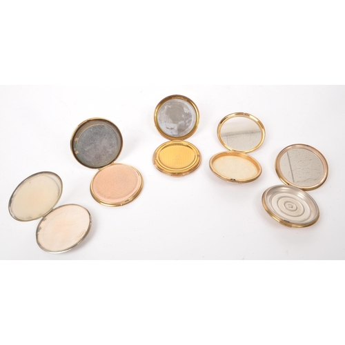 353 - A collection of five mid 20th century compact mirrors. The collection to include an enamelled exampl... 