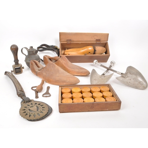 356 - Collection of vintage 20th century curios. To include shoe stretchers; metal and wooden examples wit... 