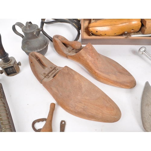 356 - Collection of vintage 20th century curios. To include shoe stretchers; metal and wooden examples wit... 