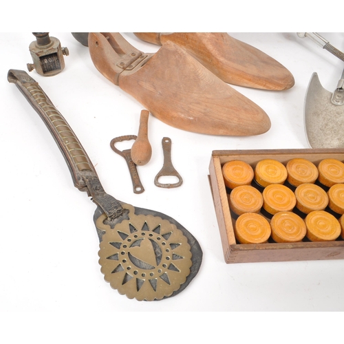 356 - Collection of vintage 20th century curios. To include shoe stretchers; metal and wooden examples wit... 