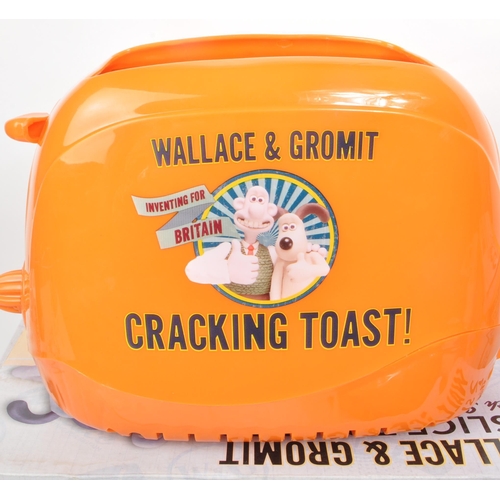 357 - Wallace & Gromit - Aardman - Two modern Wallace and Gromit sandwich toaster / toastie maker. Wit... 