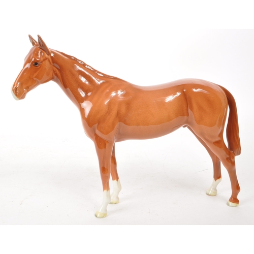 36 - Beswick - A 1940s china Bois Rousell Racehorse no. 701 figurine. Featuring a chestnut colour, a Besw... 