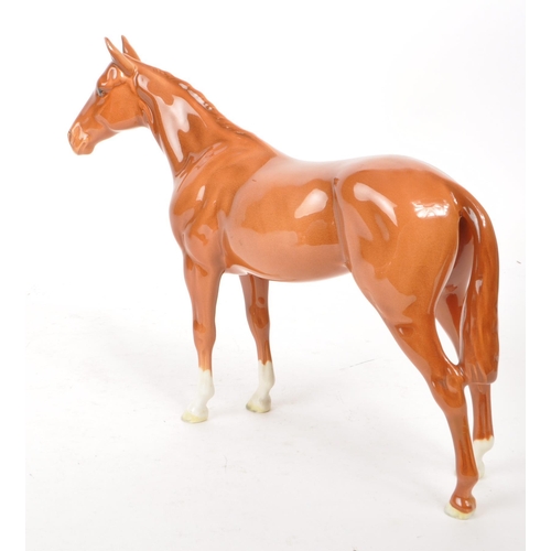 36 - Beswick - A 1940s china Bois Rousell Racehorse no. 701 figurine. Featuring a chestnut colour, a Besw... 