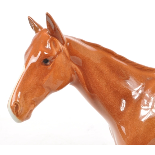 36 - Beswick - A 1940s china Bois Rousell Racehorse no. 701 figurine. Featuring a chestnut colour, a Besw... 