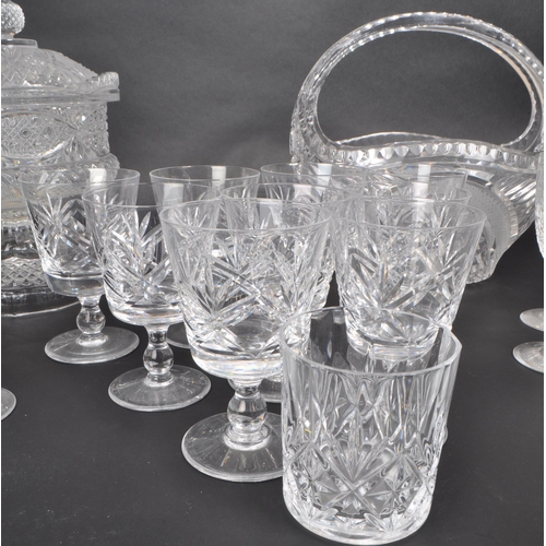 380 - A collection of 20th century crystal glass pieces, including a lidded pedestal punch bowl, a basket,... 