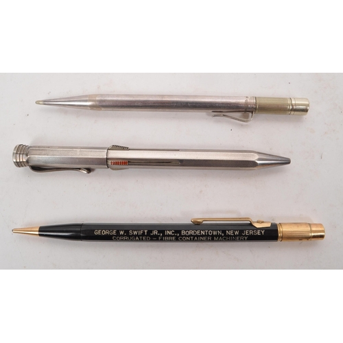 382 - A collection of three mid century propelling pencils and drawing leads, comprised of an autopoint U.... 