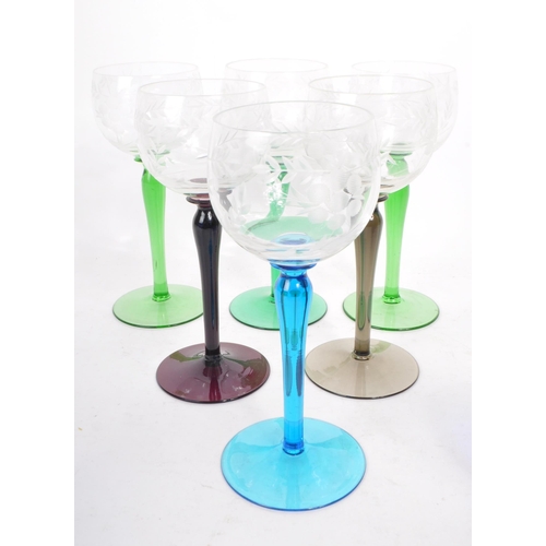 383 - Large collection of vintage 20th century coloured crystal cut glass drinking glasses. Fleur de lis p... 