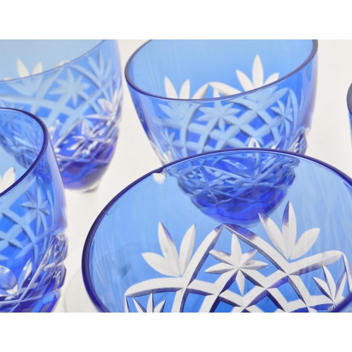 383 - Large collection of vintage 20th century coloured crystal cut glass drinking glasses. Fleur de lis p... 