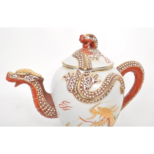 385 - Three vintage 20th century Japanese dragon porcelain teapots. Having white ground with high reflie d... 