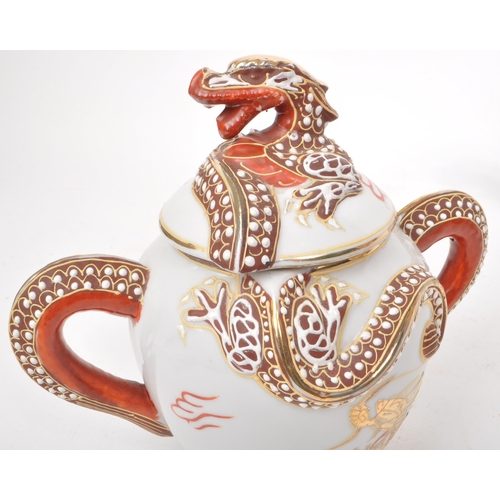 385 - Three vintage 20th century Japanese dragon porcelain teapots. Having white ground with high reflie d... 