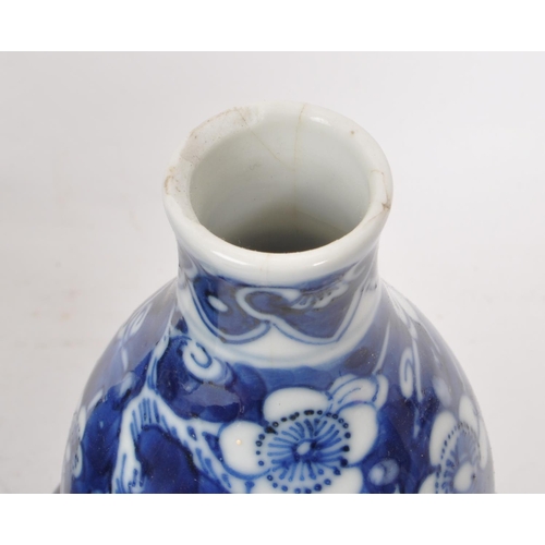 389 - Two early 20th century Chinese porcelain blue & white prunus ginger jar and vase. One example is... 