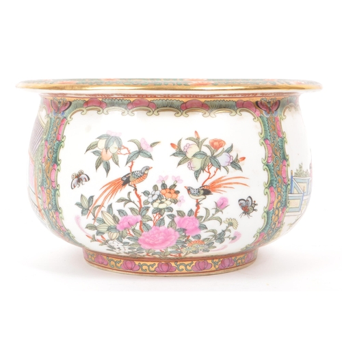 39 - A 1920s Chinese porcelain centre bowl / planter, decorated in traditional Chinese figures and floral... 