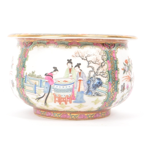 39 - A 1920s Chinese porcelain centre bowl / planter, decorated in traditional Chinese figures and floral... 